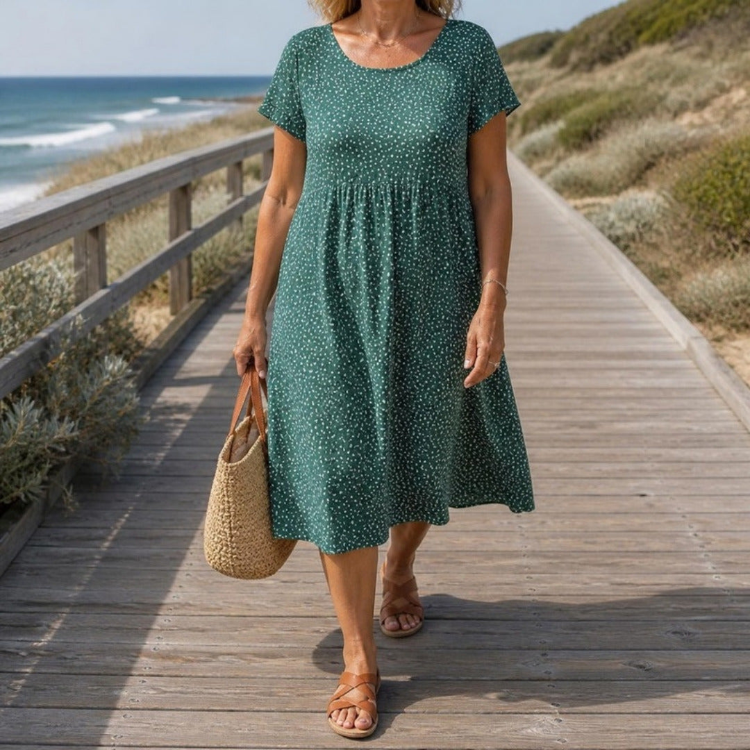 Georgina speckle print summer dress worn on a coastal boardwalk
