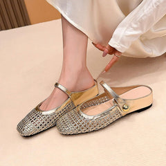 Maisie mule flats in Gold — worn, seen from above