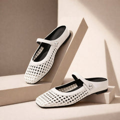 Maisie mule flats in White — pair on a neutral studio step