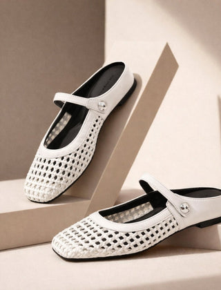 Maisie mule flats in White — pair on a neutral studio step