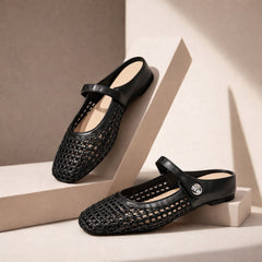 Maisie mule flats in Black — pair on a neutral studio step