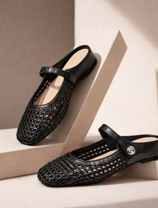 Maisie mule flats in Black — pair on a neutral studio step