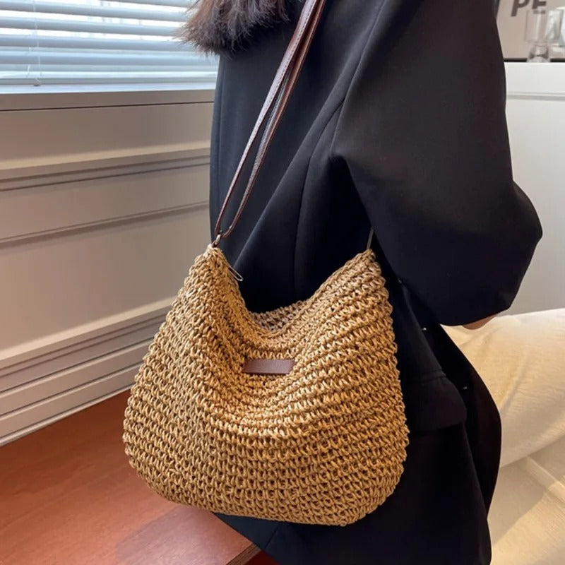 Petra woven crossbody bag worn on the shoulder
