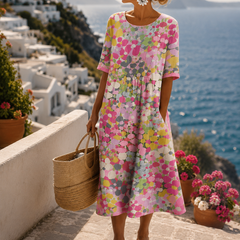 Primrose midi dress in Pink worn outdoors