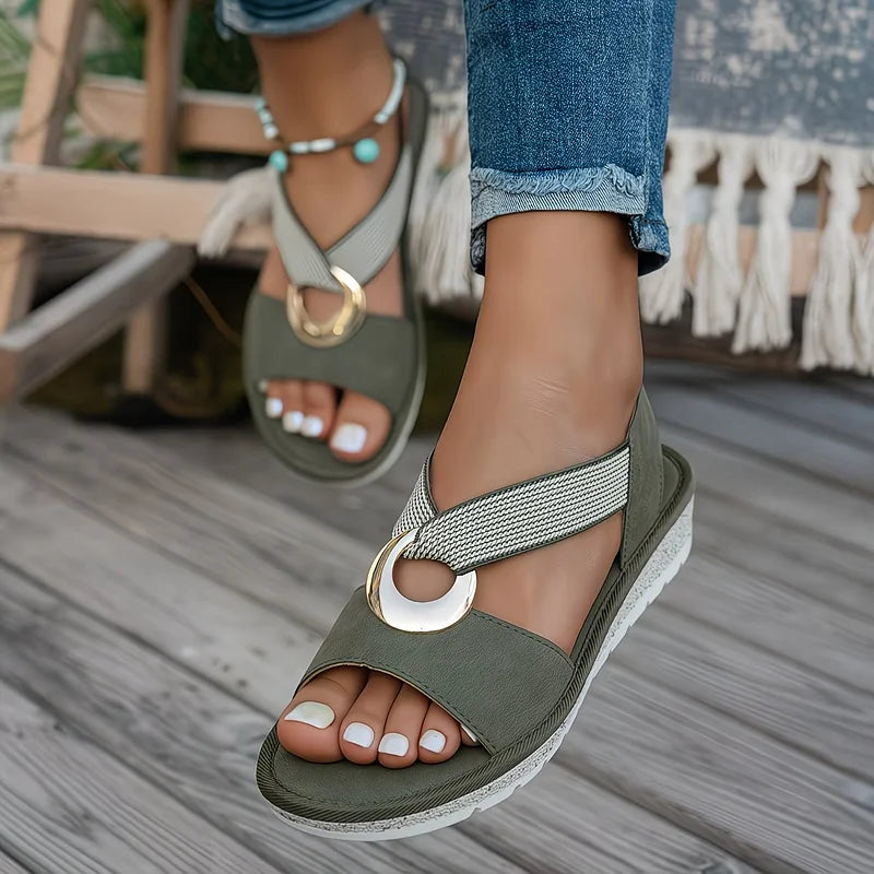 Tilda wedge sandals in Green worn on foot, front angle